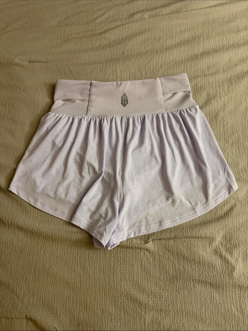 Free People LIGHT AS AIR HIGH WAIST RUNNING SHORTS IN Lavender